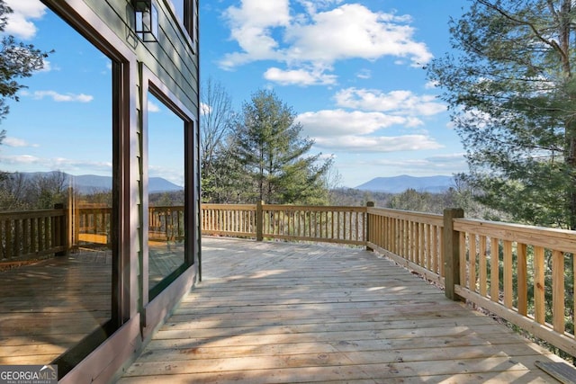 deck featuring a mountain view