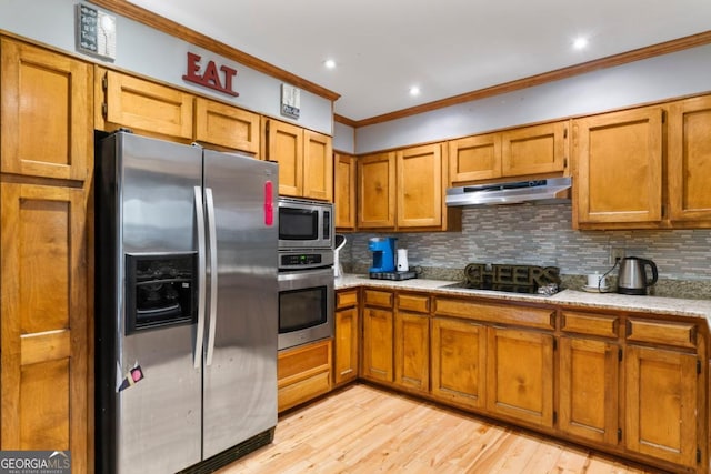 kitchen featuring backsplash, light wood-type flooring, ornamental molding, and appliances with stainless steel finishes