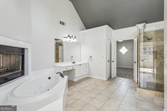 bathroom featuring vanity, tile patterned floors, high vaulted ceiling, and plus walk in shower