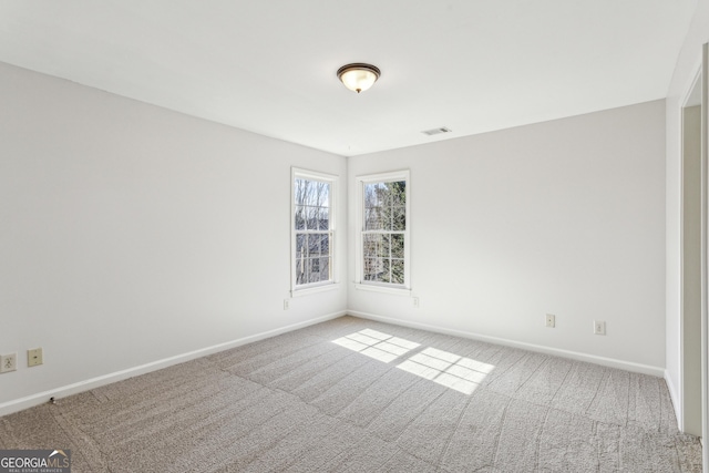 view of carpeted spare room