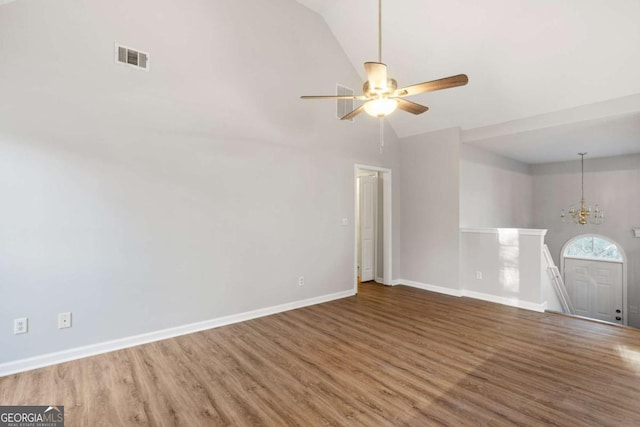 kitchen with appliances with stainless steel finishes, light hardwood / wood-style floors, sink, and white cabinets