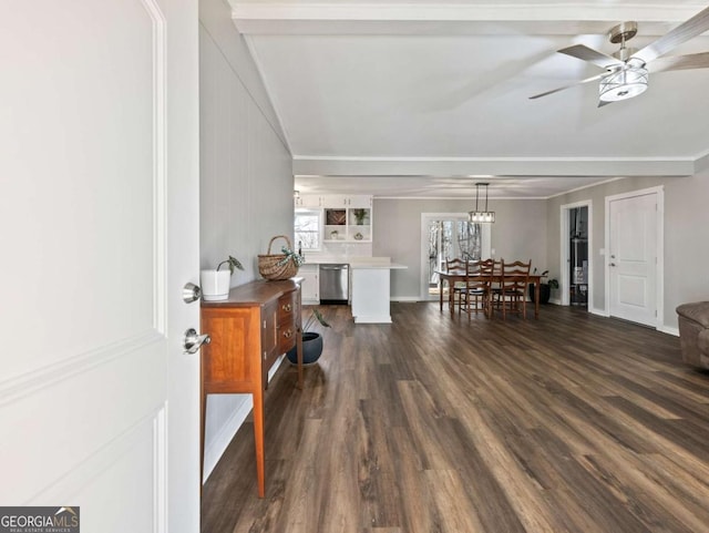 foyer with beam ceiling, dark hardwood / wood-style floors, and ceiling fan