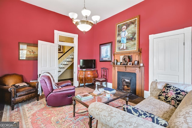 living room featuring an inviting chandelier