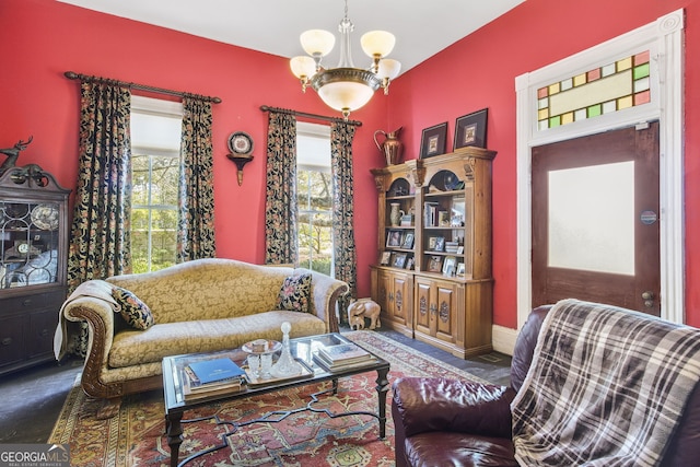 living room featuring a notable chandelier