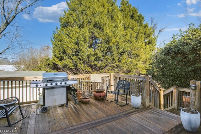 wooden terrace with grilling area