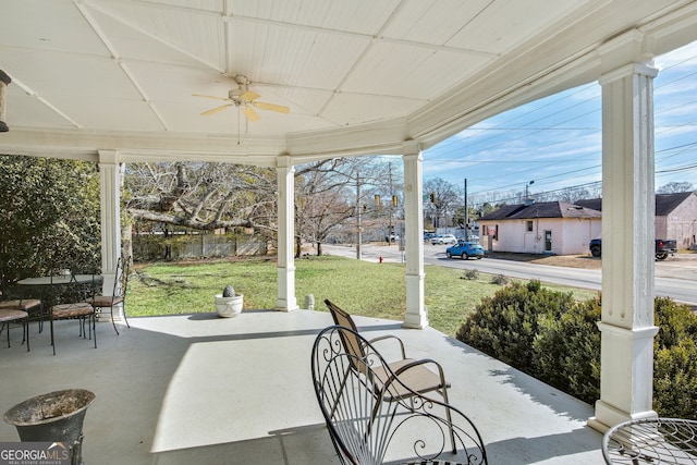 view of patio featuring ceiling fan