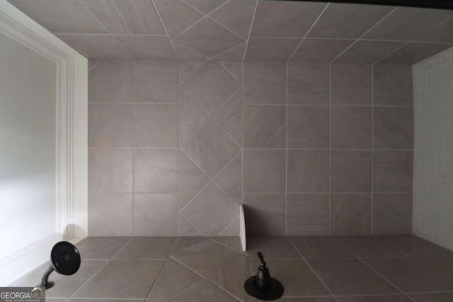 bathroom featuring tile patterned floors and walk in shower