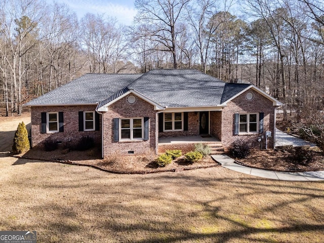 ranch-style house with a porch and a front yard