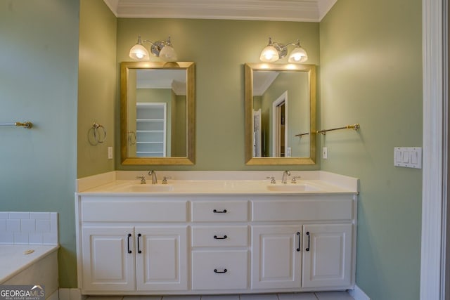 bathroom featuring crown molding, a tub, and vanity