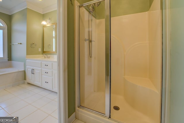 bathroom with independent shower and bath, crown molding, tile patterned floors, and vanity