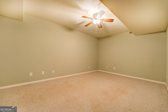 carpeted empty room with ceiling fan