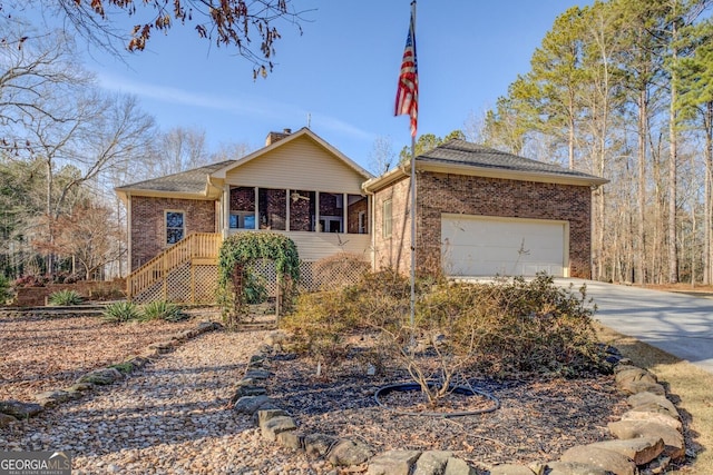 ranch-style home featuring a garage