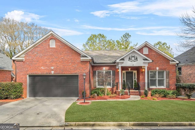 view of property featuring a garage and a front yard