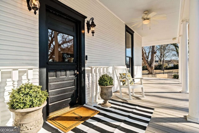 doorway to property with ceiling fan