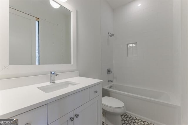 full bathroom with shower / washtub combination, toilet, and vanity