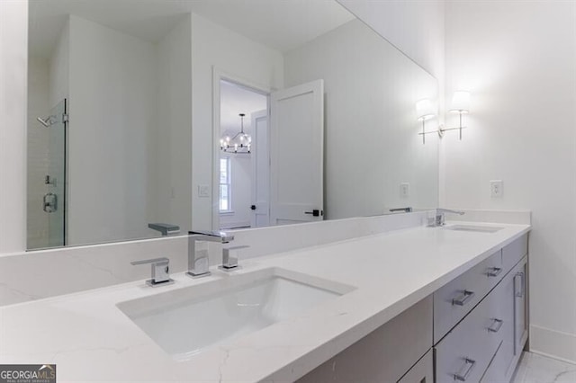 bathroom with vanity and an enclosed shower