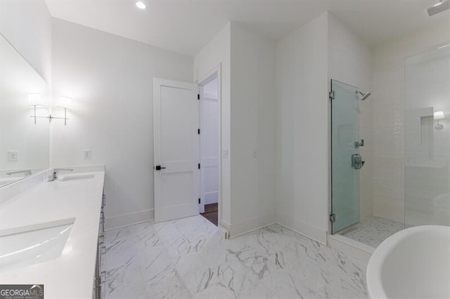 bathroom featuring vanity and plus walk in shower