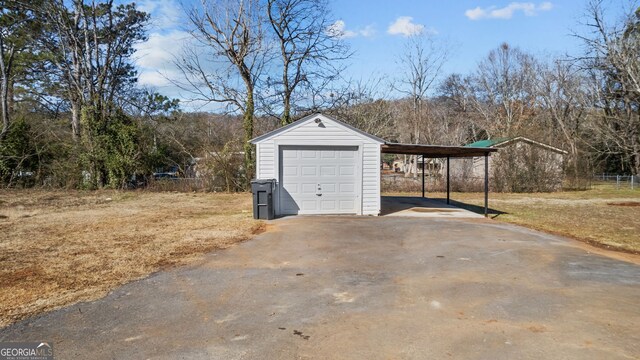 garage featuring a carport