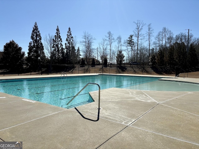 view of pool featuring a patio