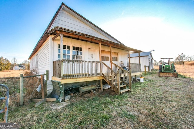 back of property with a deck