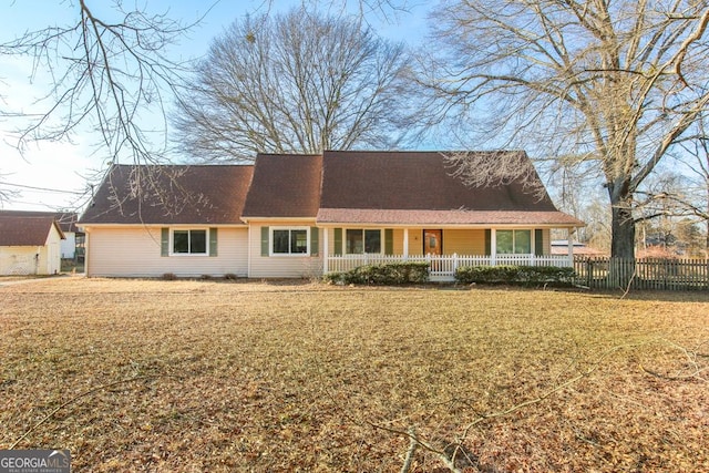 444 Agape Rd, Carrollton, GA 30116 - cape cod house featuring covered porch