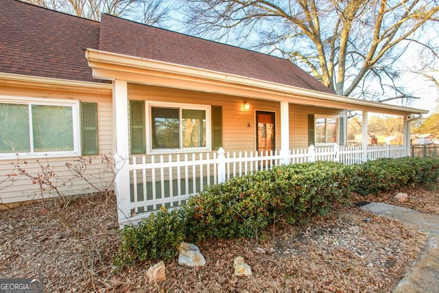 444 Agape Rd, Carrollton, GA 30116 - view of front of house with covered porch and a shingled roof