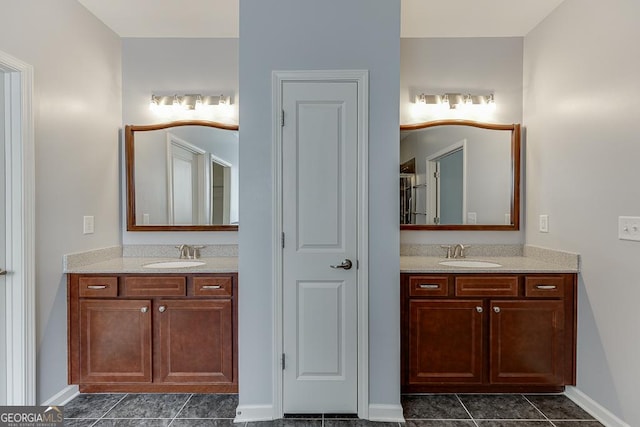 bathroom featuring tile patterned floors and vanity