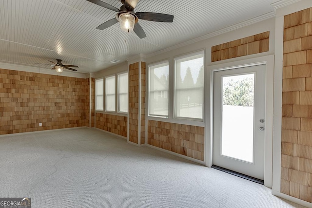 interior space with a ceiling fan