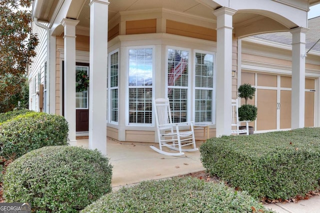 doorway to property with covered porch