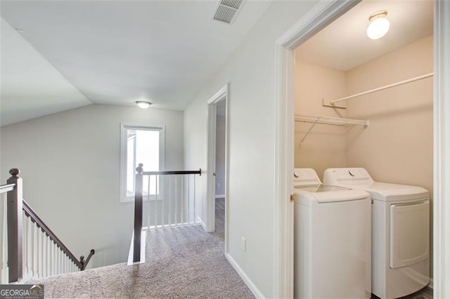 laundry area featuring carpet floors and washer and dryer