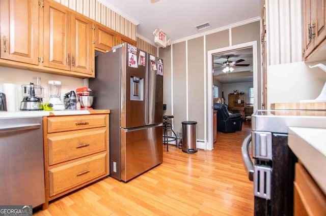 kitchen featuring light hardwood / wood-style flooring, stainless steel fridge, ceiling fan, ornamental molding, and a baseboard radiator