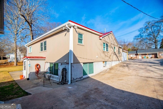 back of property with a patio area