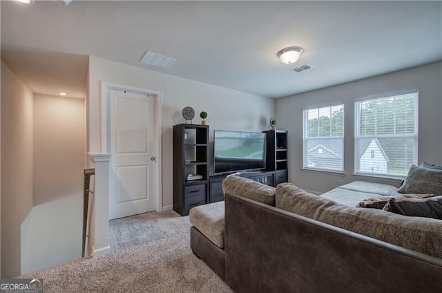 living room with light colored carpet