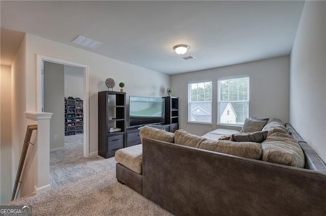 living room with light colored carpet