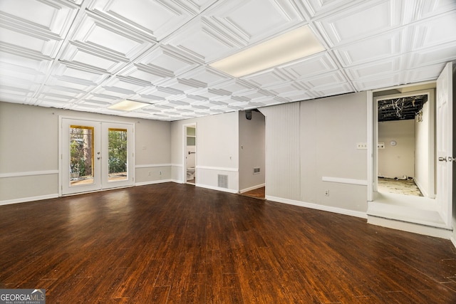 interior space with dark wood-type flooring and french doors