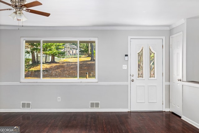 foyer featuring ornamental molding, ceiling fan, and dark hardwood / wood-style flooring