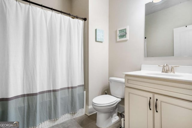 full bathroom featuring vanity, toilet, and shower / tub combo