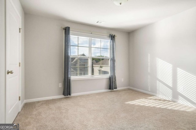 view of carpeted spare room