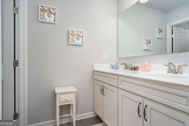 bathroom featuring vanity and tile patterned flooring