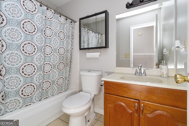 full bathroom featuring shower / tub combo with curtain, vanity, toilet, and tile patterned flooring