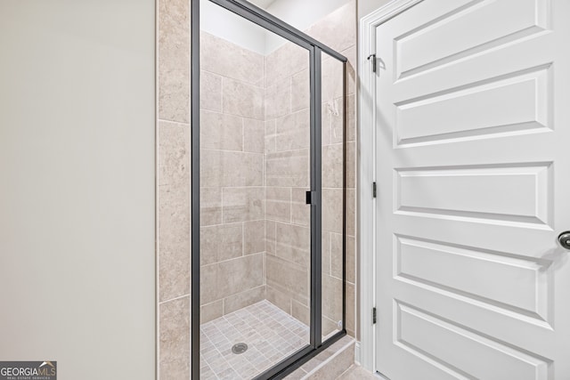 bathroom with an enclosed shower