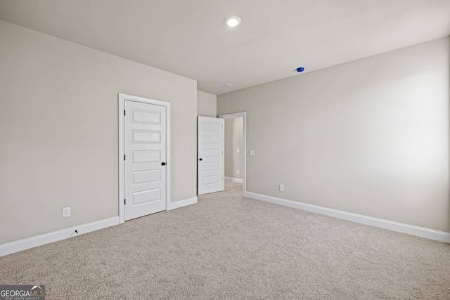 unfurnished bedroom with carpet flooring