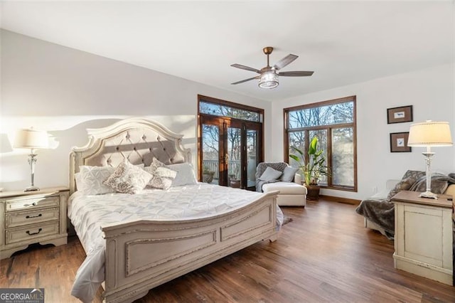 bedroom with ceiling fan and dark hardwood / wood-style flooring