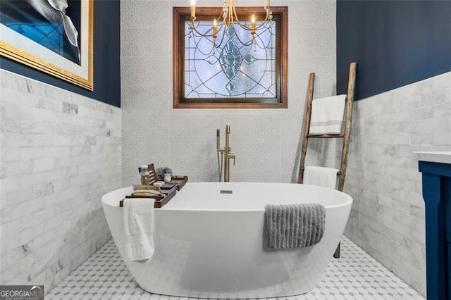 bathroom featuring tile patterned flooring, tile walls, and a washtub