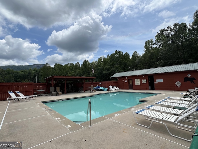 view of pool with a patio