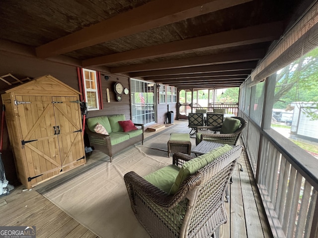 sunroom / solarium with beam ceiling