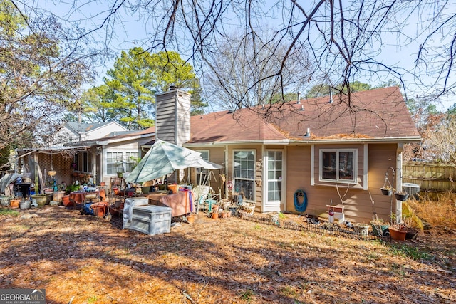 back of property with central air condition unit