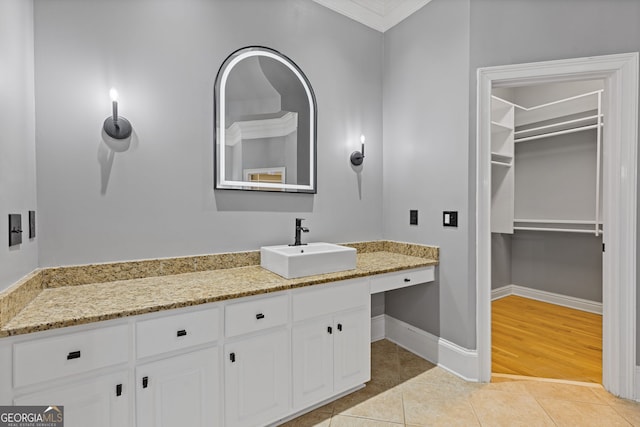 bathroom with vanity and tile patterned floors