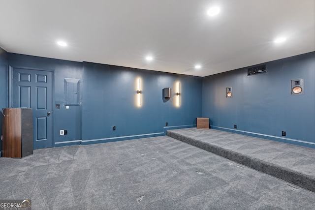 cinema room featuring carpet flooring