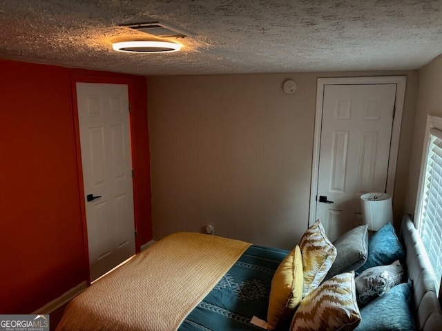 bedroom with a textured ceiling